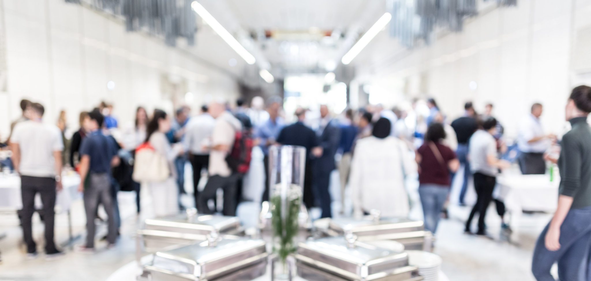 Blured image of businesspeople at coffee break at conference meeting. are networking events worth it?