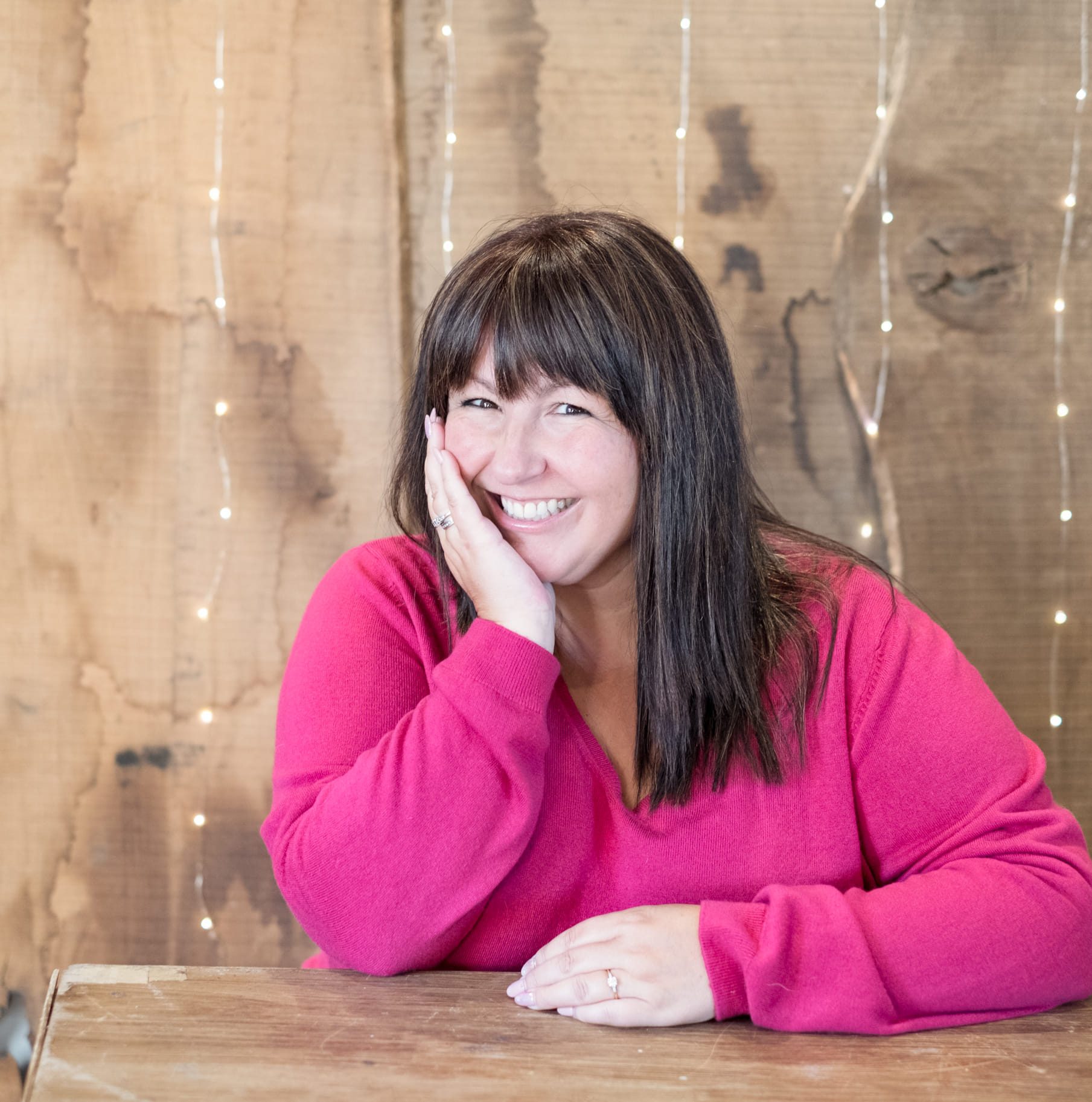 Woman smiling and looking at camera